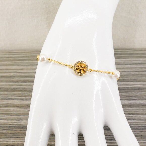Tory Burch Crystal Logo & Imitation Pearl Station Bracelet Ivory/Tory Gold OS - Picture 11 of 16